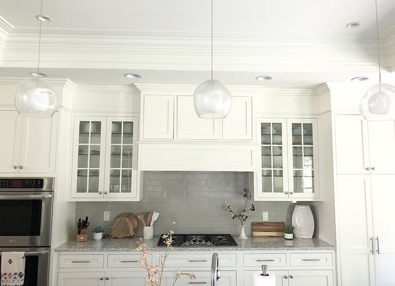 how to fill space between cabinets and ceiling | caroline on