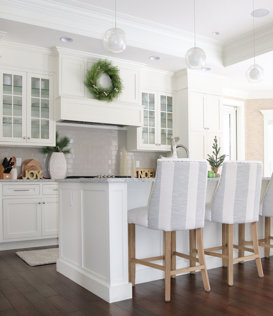 neutral textured Christmas home white kitchen with decorations