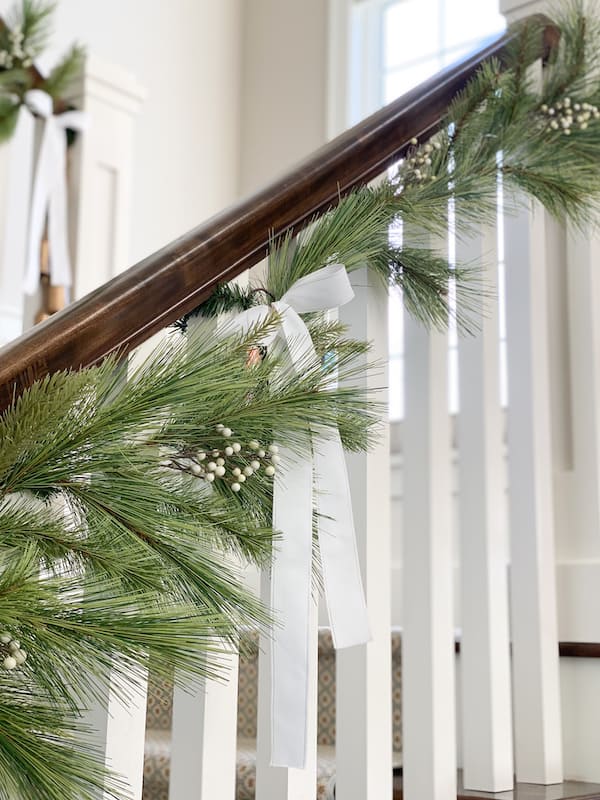 faux garland hearth and hand target with white ribbon and white berries